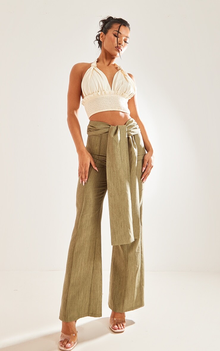 

PrettyLittleThing Расклешенные брюки цвета хаки с завязками спереди