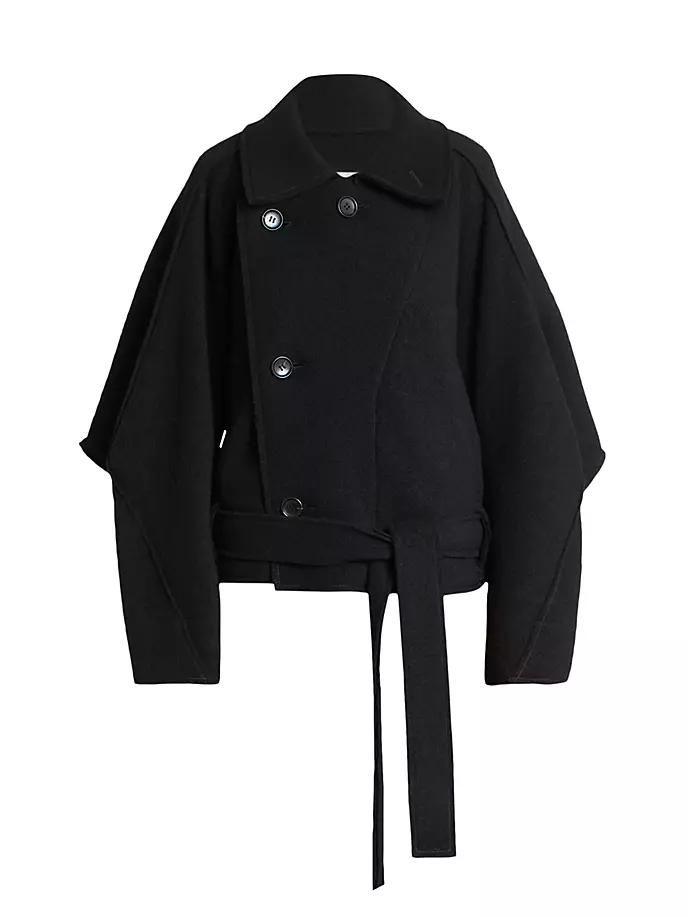 

Из кубического пальто Issey Miyake, черный
