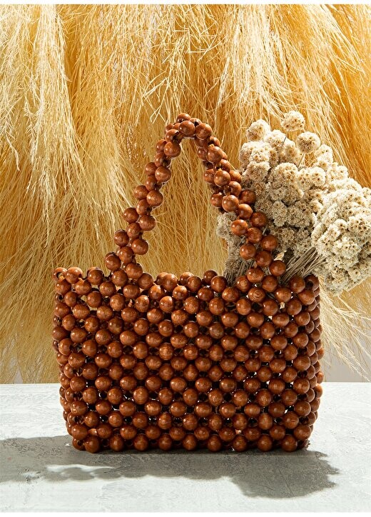 

Желто-коричневая женская деревянная сумка 28x20x8 см MONTES Fabrika, загар