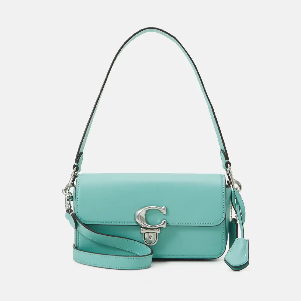 

Сумка Coach Glovetanned Studio Baguette, голубой