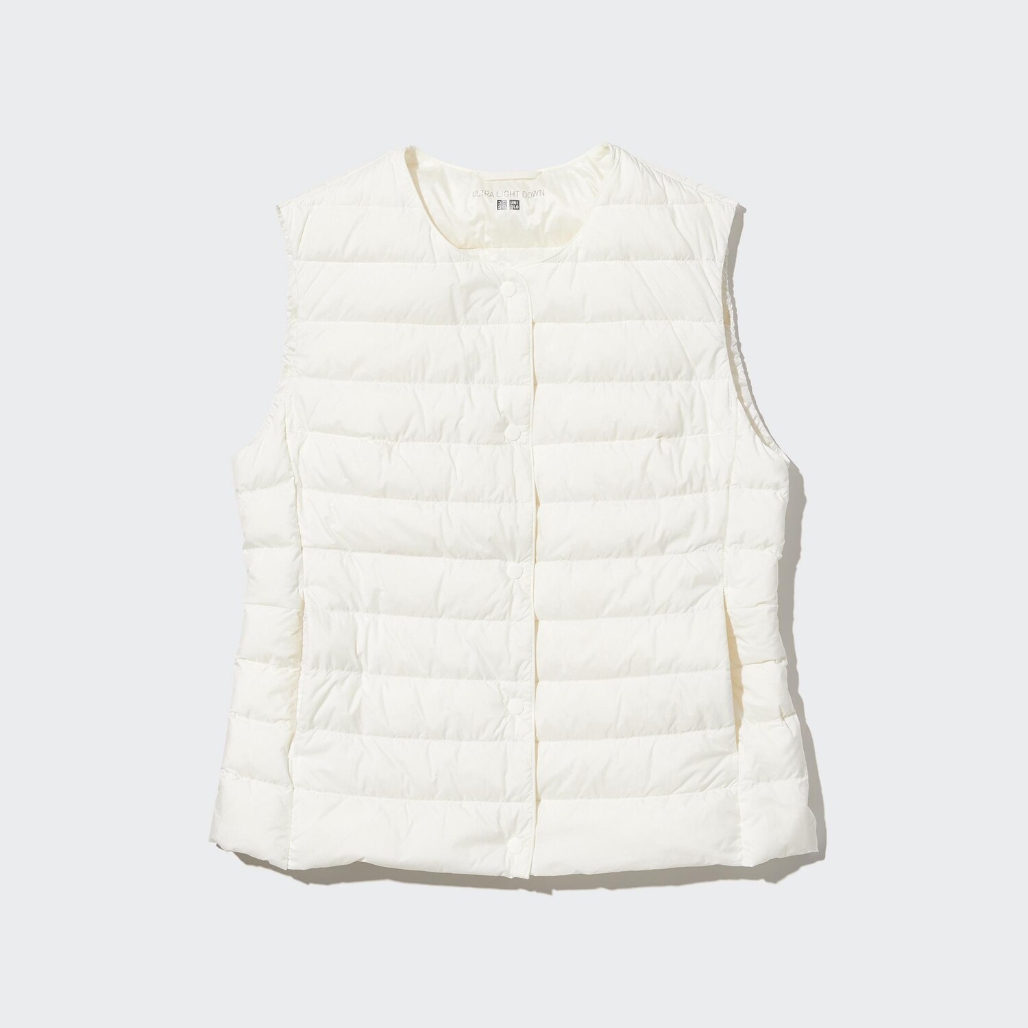 

Жилет Uniqlo женский пуховый, молочный