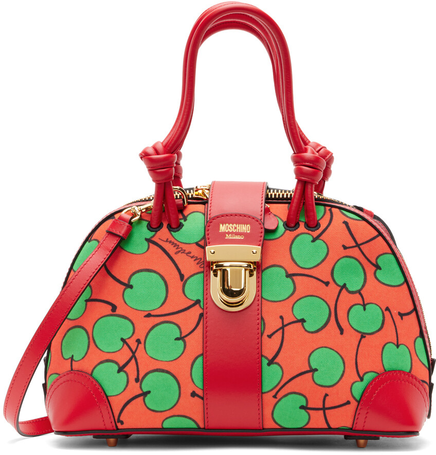 

Красная сумка с ручкой сверху и принтом Cherry Moschino