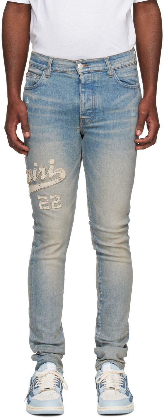 

Джинсы цвета индиго с аппликацией AMIRI