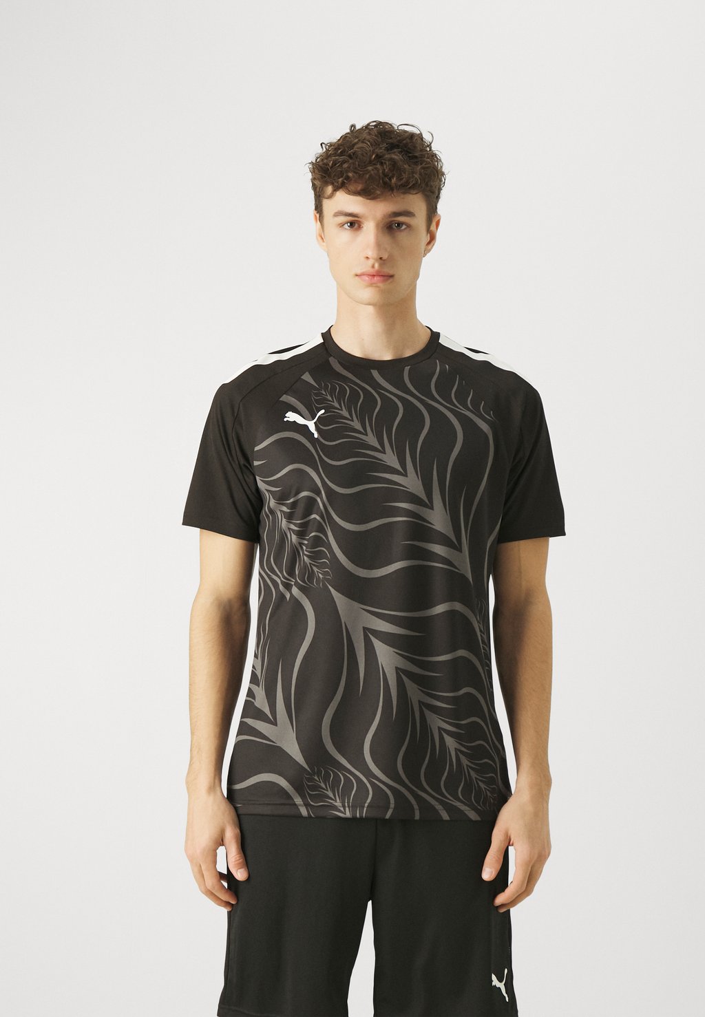 цена Спортивная футболка Individualliga Graphic Puma, цвет puma black