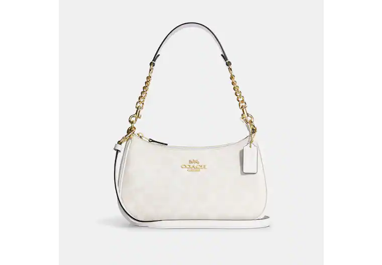 

Сумка Coach Teri Shoulder In Signature Canvas, белый глянцевый