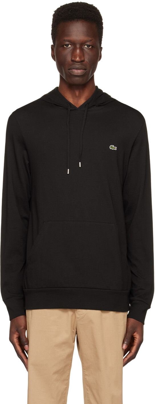 

Худи черного цвета с нашивками Lacoste