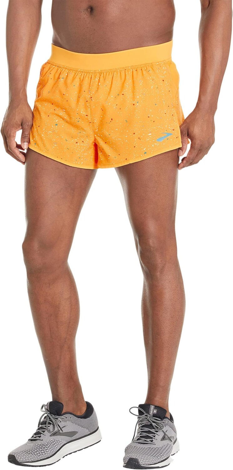 

Шорты Sherpa с разрезом 3 дюйма Brooks, цвет Sun Glow Speckle Print