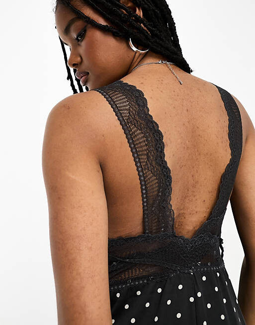 

Черное атласное платье-комбинация в горошек с кружевом Free People