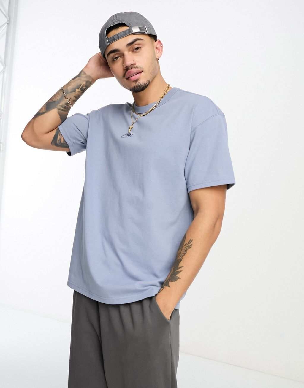 

Пыльно-синяя футболка с логотипом Nike Premium Essentials, Синий