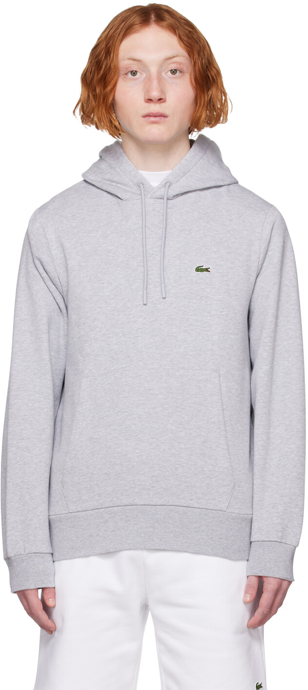 

Серый худи с нашивками Lacoste