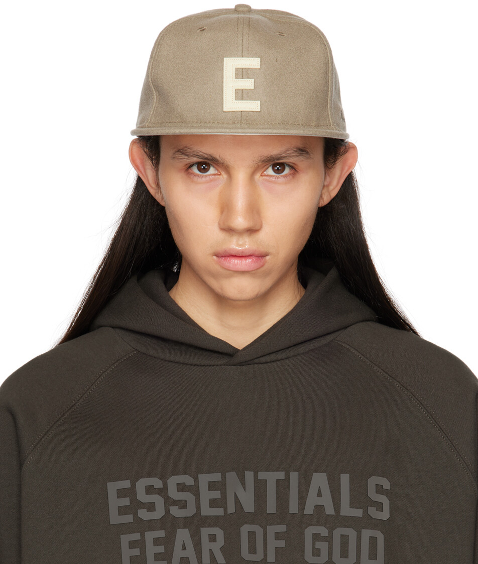 

Серо-коричневая кепка New Era Edition Essentials
