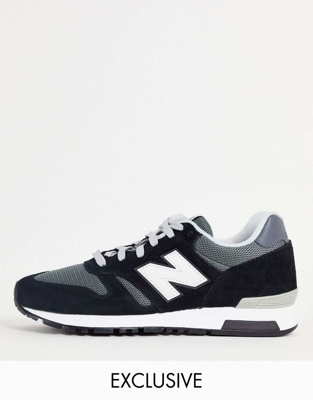 Черные кроссовки New Balance 565 Classic