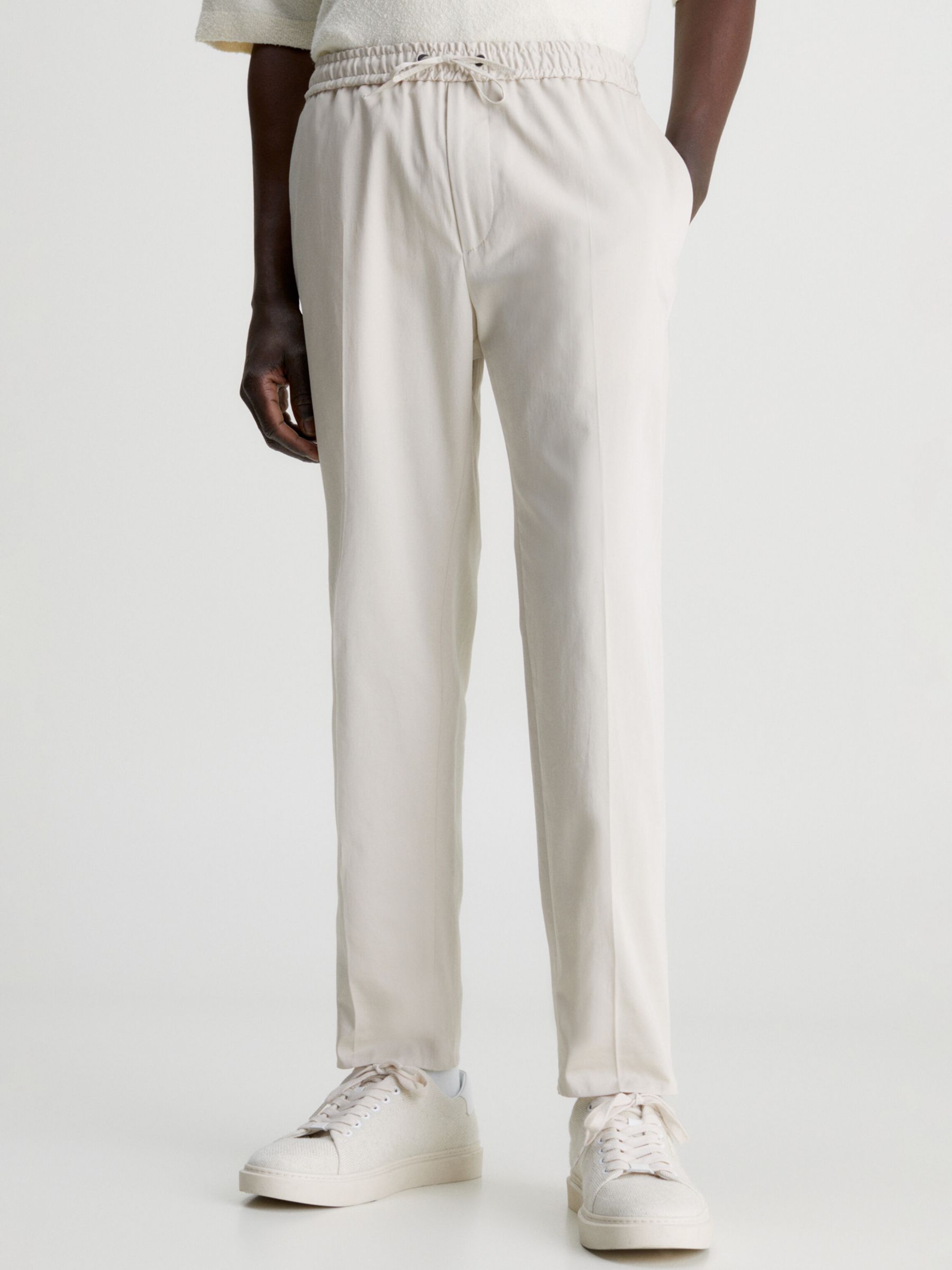 Брюки-джоггеры из эластичного атласа Calvin Klein, каменно-бежевого цвета