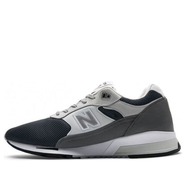 

Кроссовки 1991 года, сделано в Англии New Balance, серый