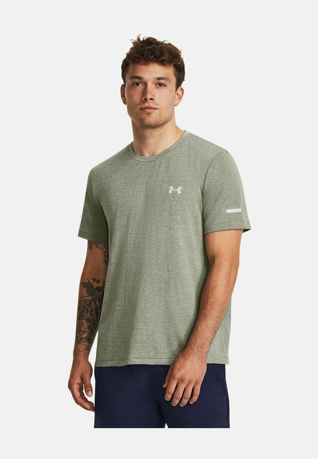 

Базовая футболка SEAMLESS STRIDE LAUF Under Armour, зеленый