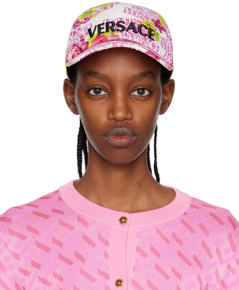 

Бело-розовая кепка с принтом Versace