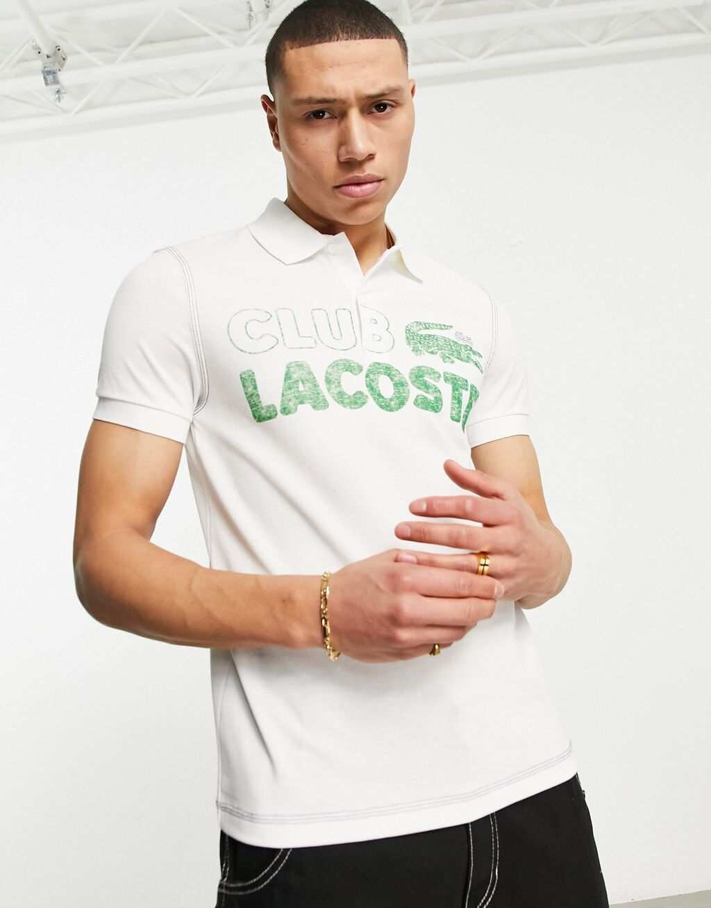 

Белая рубашка-поло Lacoste Club с графикой спереди