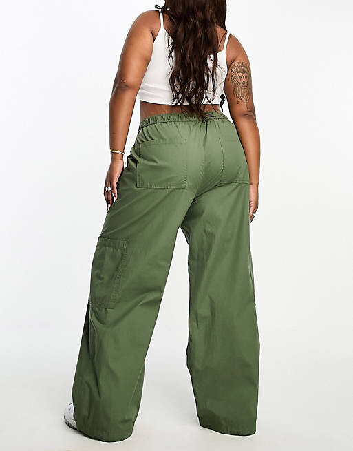 

Брюки карго цвета хаки с чистыми застежками ASOS DESIGN Curve