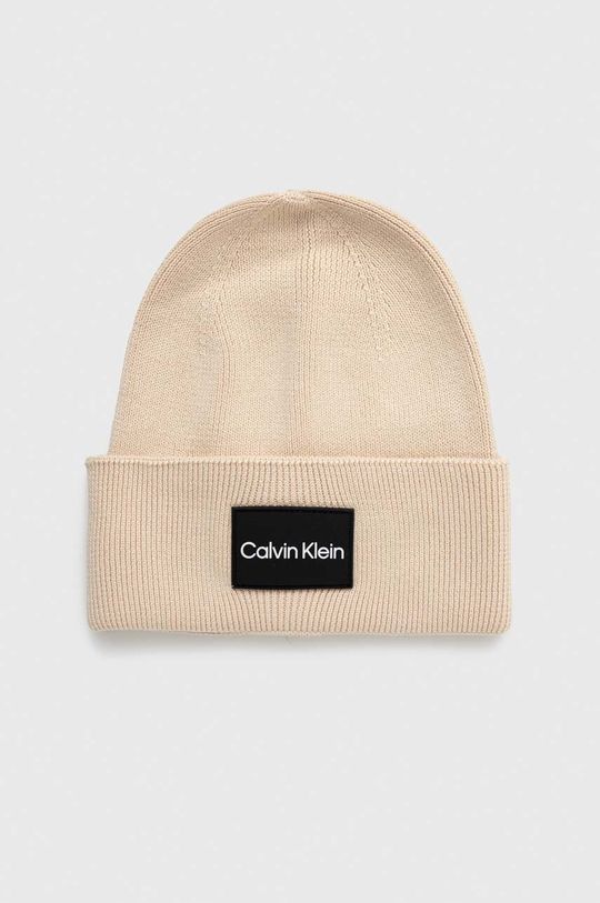 цена Хлопчатобумажная шапка Calvin Klein, бежевый