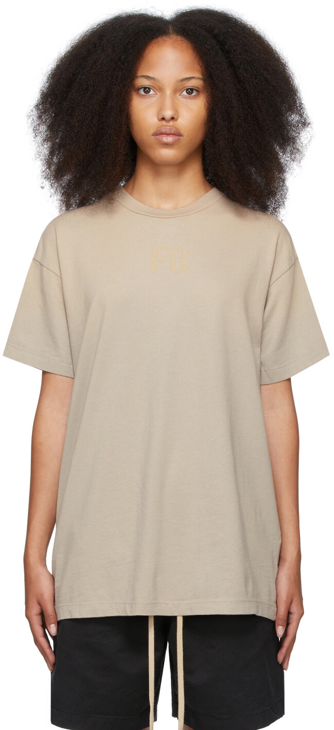 

Бежевая футболка с надписью FG Fear of God