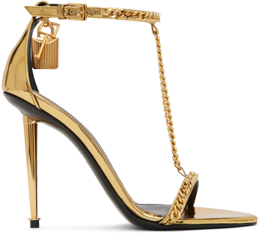 

Золотые босоножки на каблуке с висячим замком TOM FORD