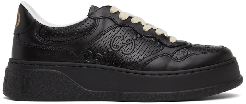 

Черные кроссовки с тиснением GG Gucci