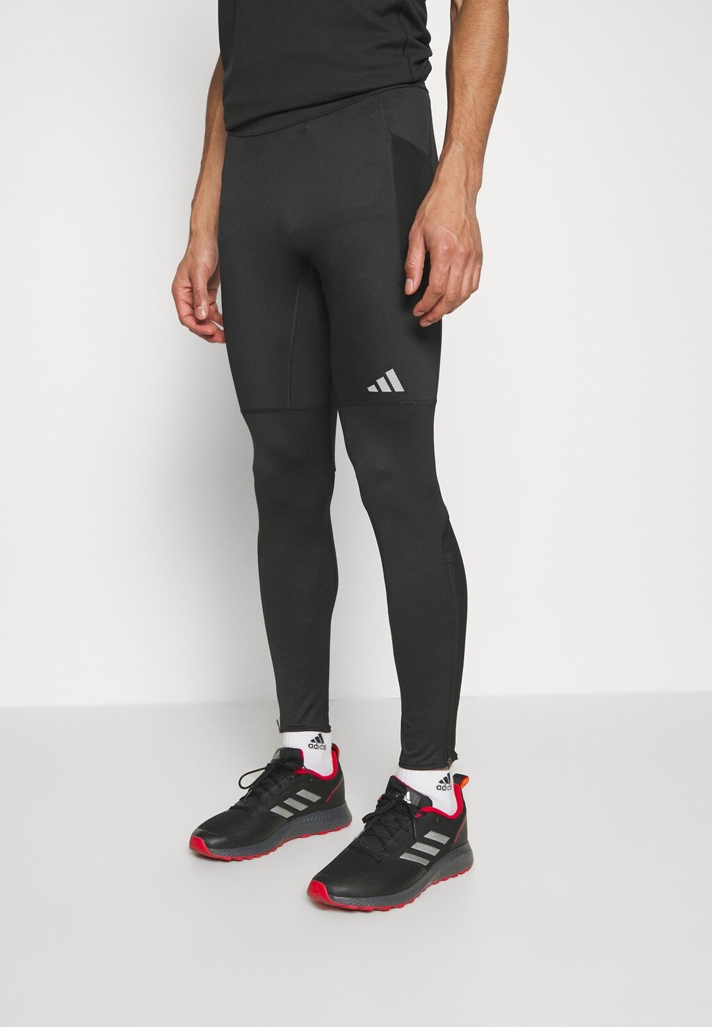 

Тайтсы Adidas