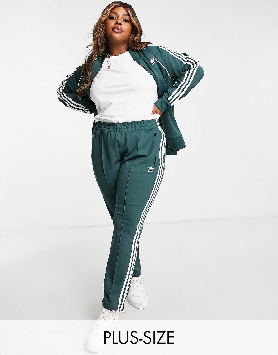 

Темно-зеленые спортивные брюки adidas Originals Plus SST