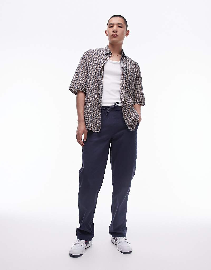 

Topman – темно-синие брюки-чиносы свободного кроя с эластичной талией