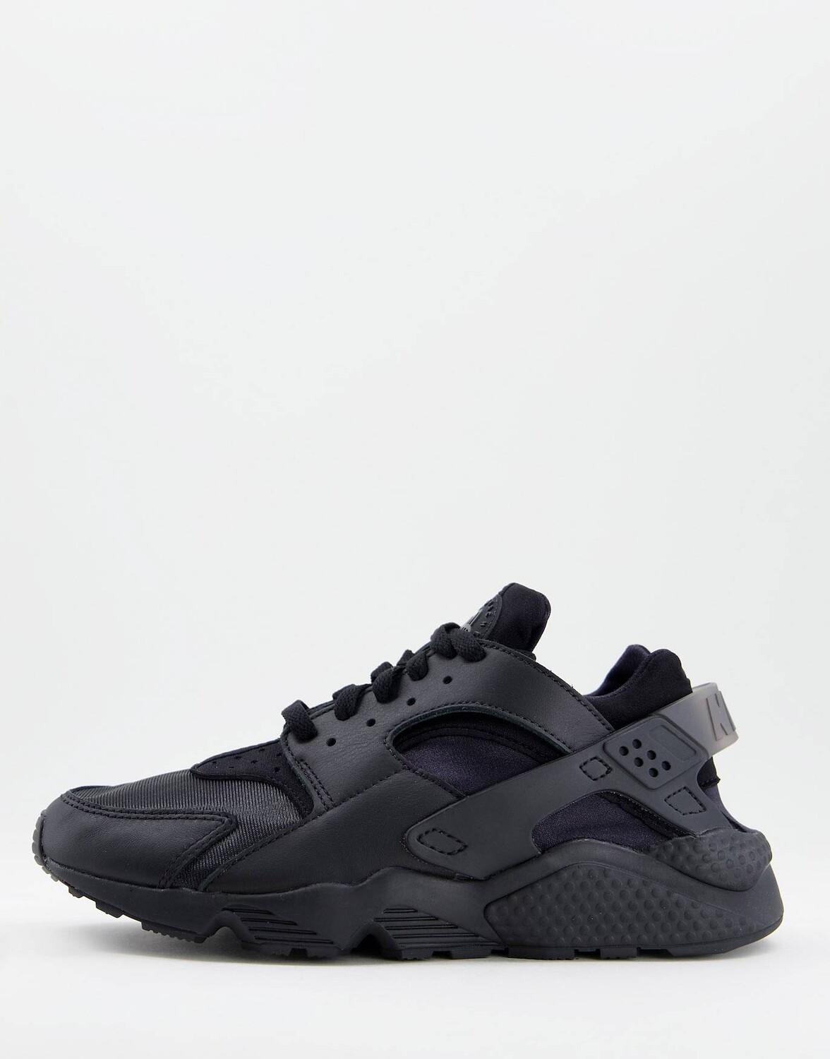 

Черные кроссовки Nike Air Huarache