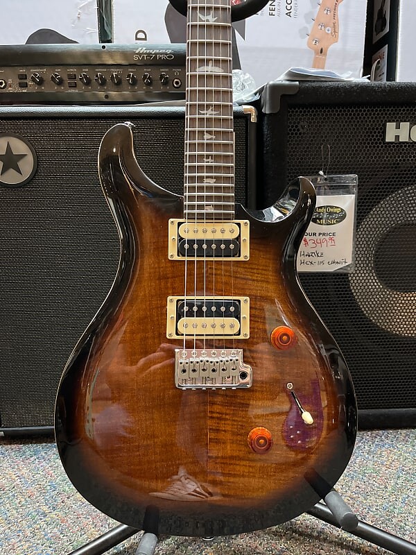 

PRS SE Custom 24 Черное золото Солнечные лучи