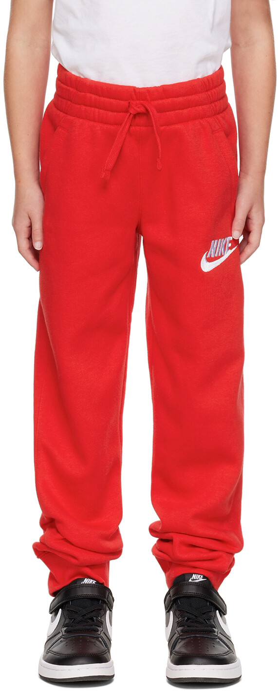 

Детские красные спортивные штаны Club Lounge Nike