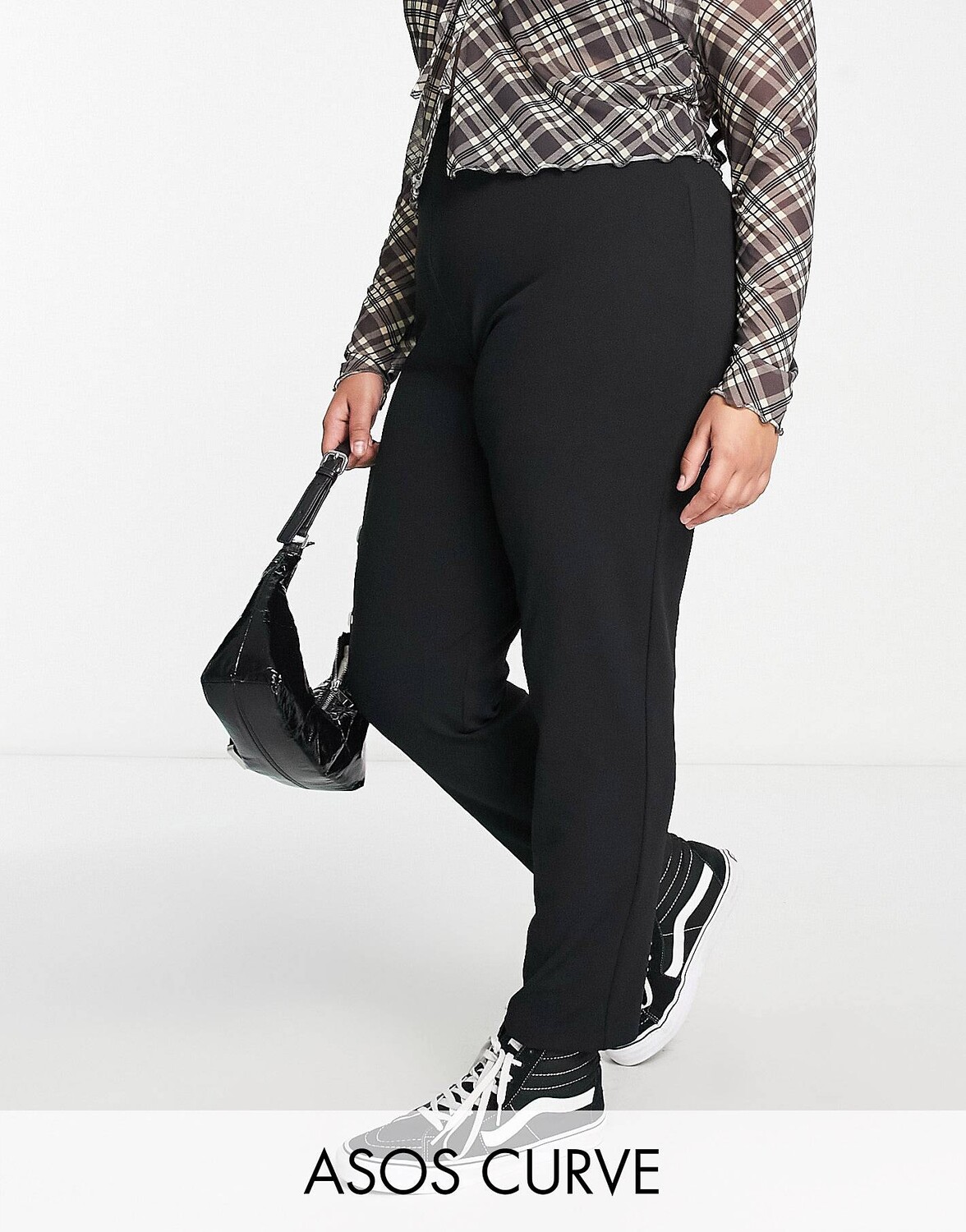 

Черные зауженные брюки из джерси ASOS DESIGN Curve, Черный