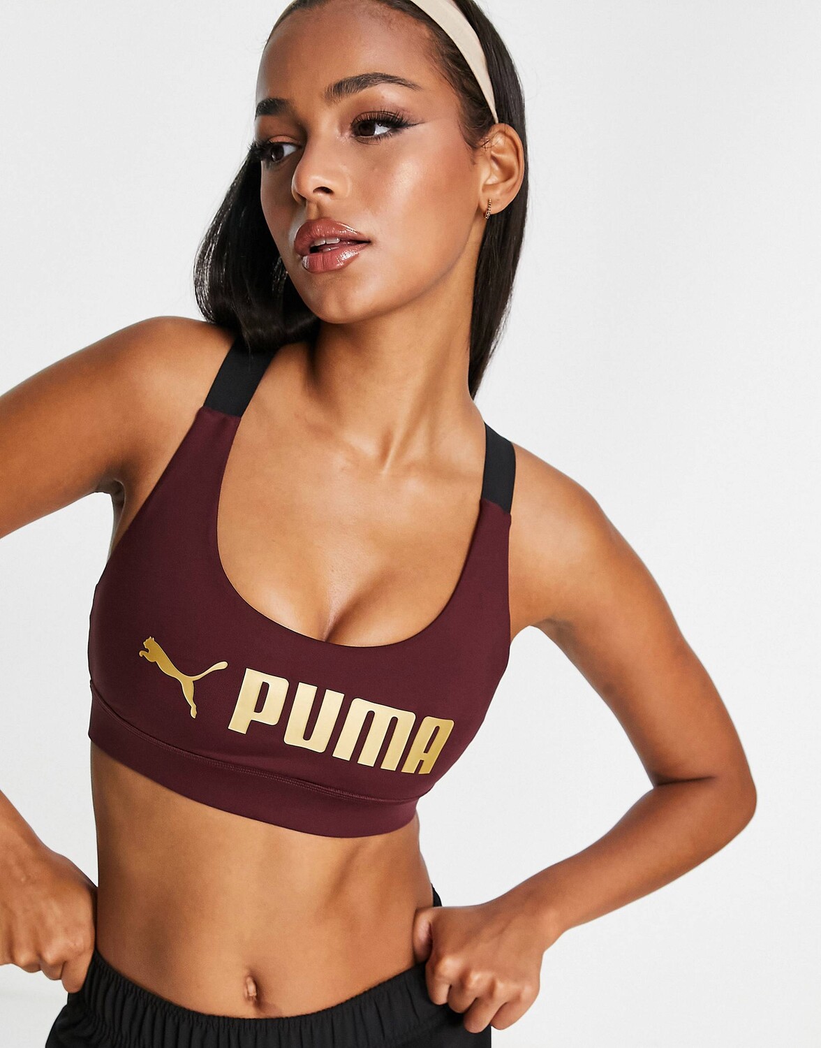 

Фиолетовый спортивный бюстгальтер со средней посадкой Puma