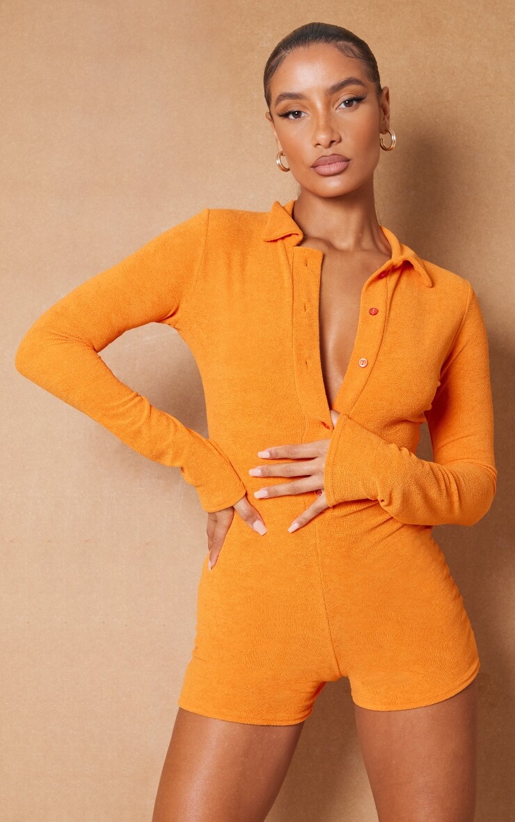 

PrettyLittleThing Оранжевый махровый комбинезон на пуговицах с длинными рукавами