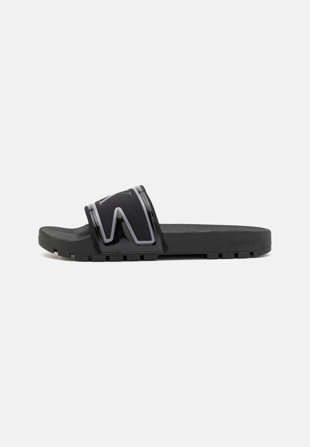 

Мюли Calvin Klein Jeans TRUCK SLIDE IN, цвет triple black
