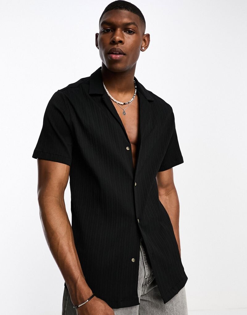

Черная свободная рубашка в рубчик ASOS DESIGN