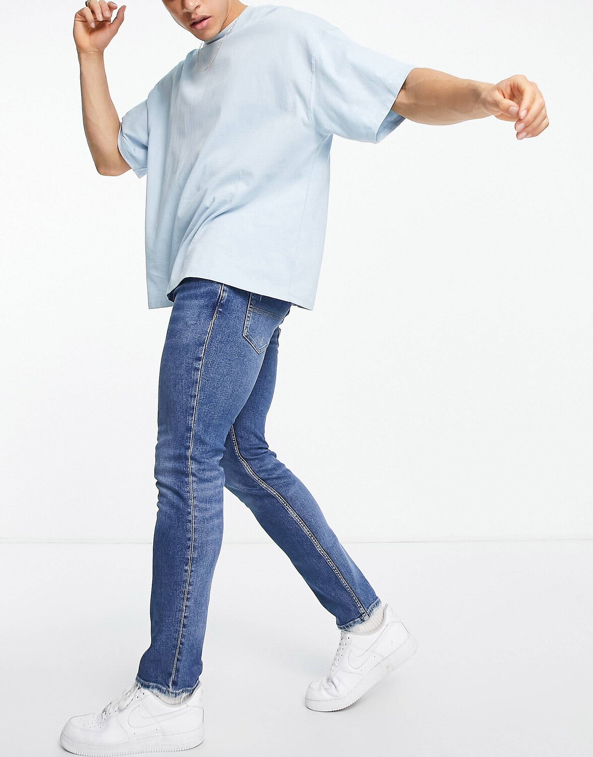 

Узкие джинсы средней потертости Tommy Jeans Scanton