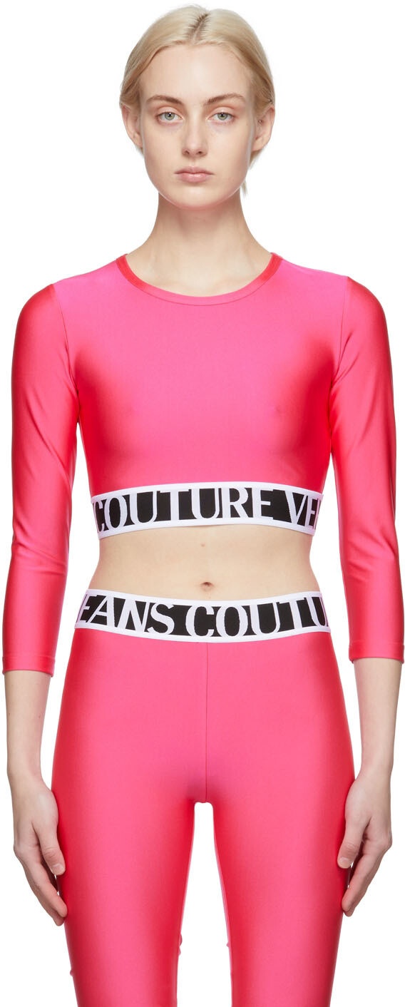 

Розовая блестящая укороченная футболка с длинным рукавом Versace Jeans Couture