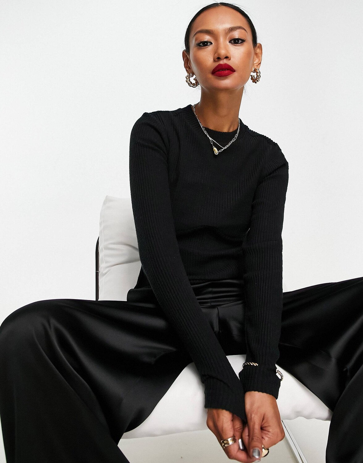 

Черный супермягкий топ в рубчик со швами ASOS DESIGN