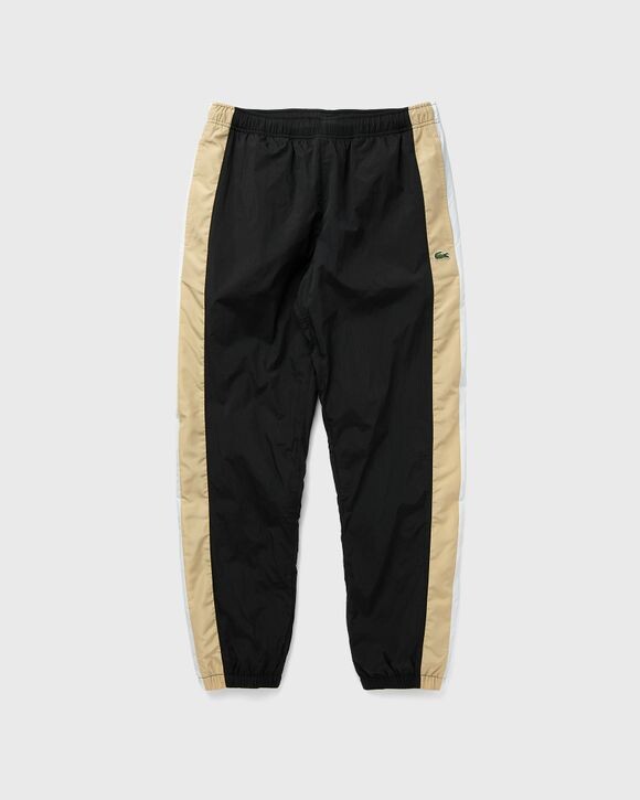

Спортивный костюм Lacoste Water Resistant Sweatpants, цвет black/croissant-flour