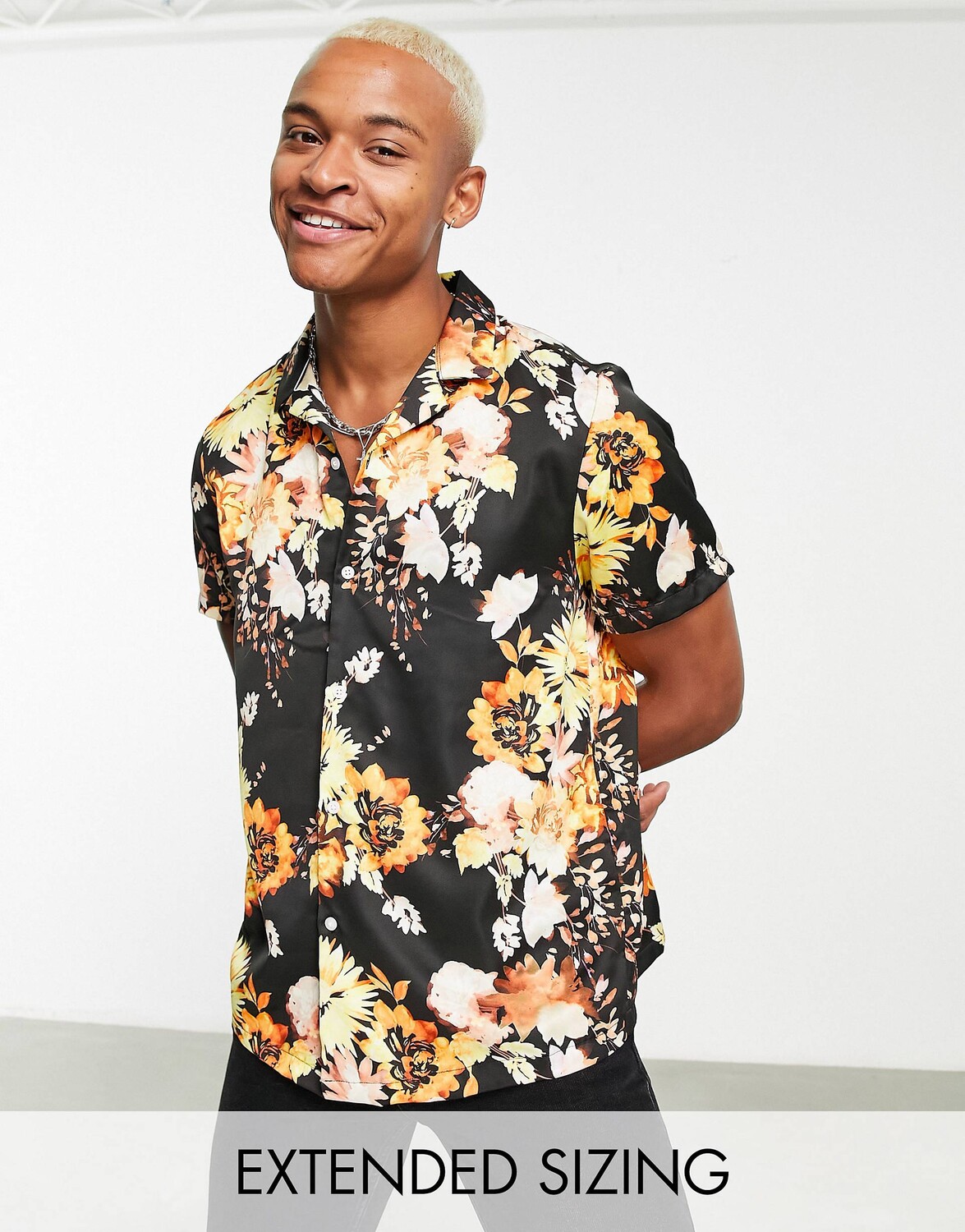 

Черная атласная рубашка свободного кроя с цветочным принтом ASOS DESIGN