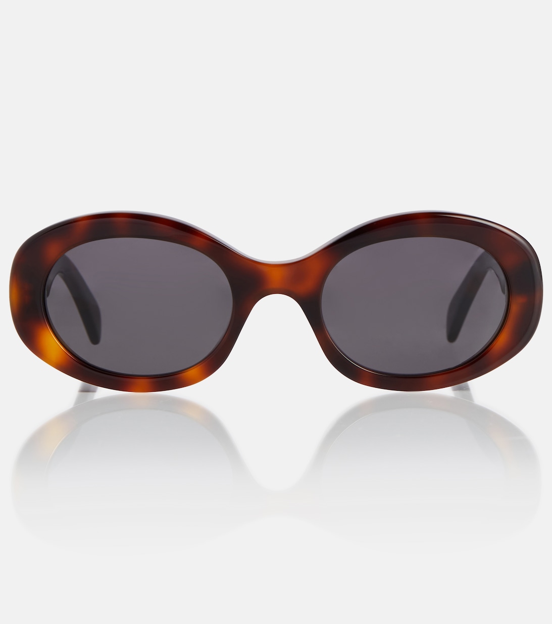цена Солнцезащитные очки в овальной оправе Triomphe 01 Celine, коричневый