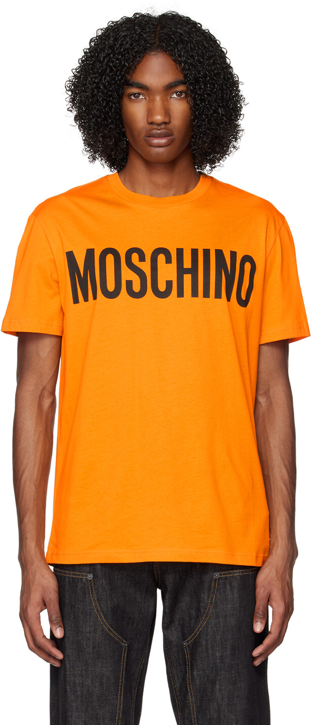 

Оранжевая футболка с принтом Moschino