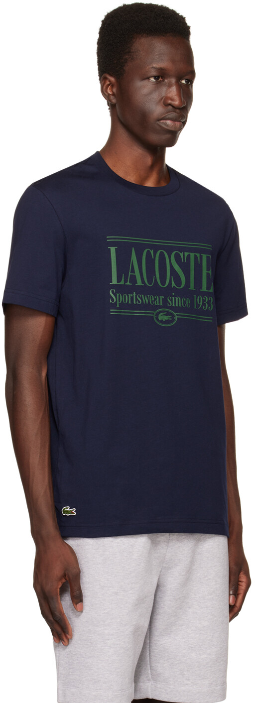 

Темно-синяя футболка с рисунком Lacoste