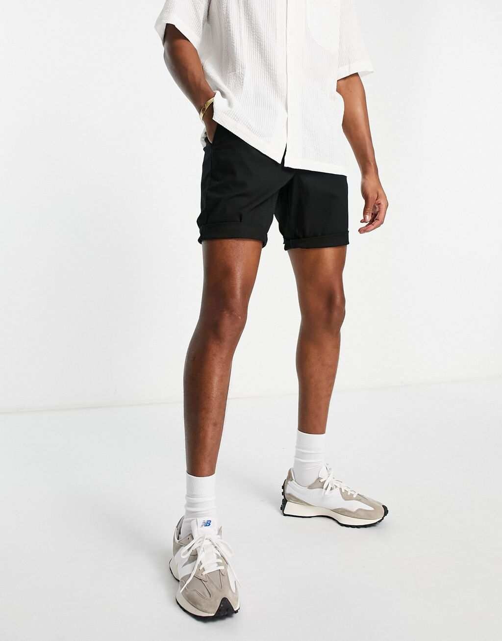 

Черные узкие шорты чинос ASOS DESIGN укороченной длины
