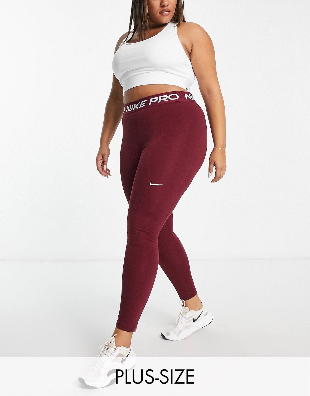 

Темно-розовые леггинсы Nike Pro Training Plus 365 7/8