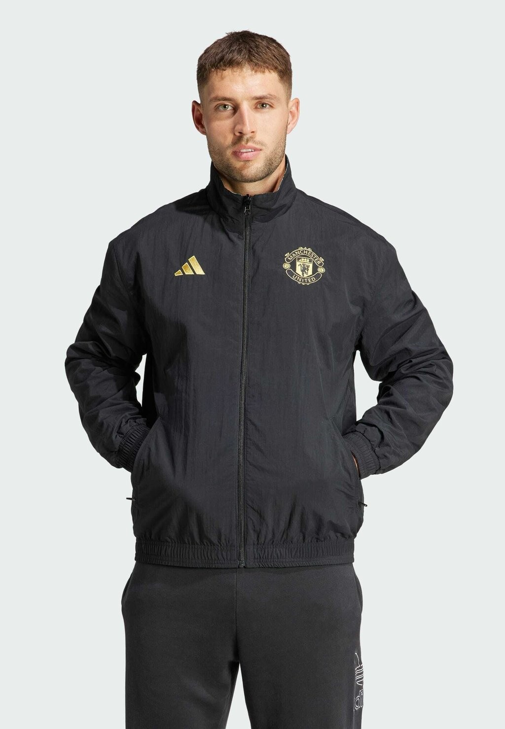 

Куртка тренировочная MANCHESTER UNITED STONE ROSES adidas Performance, цвет black multicolor