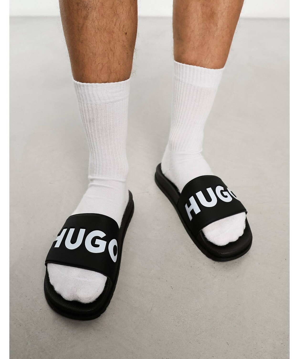 

Черные шлепанцы HUGO Match it