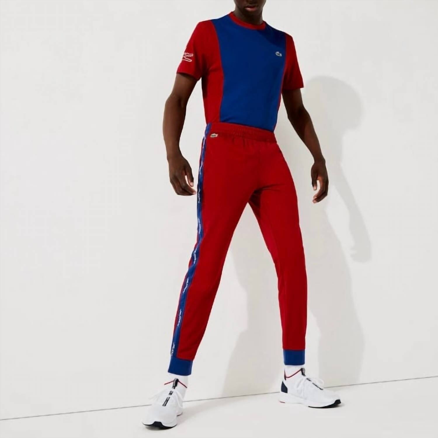 

Мужские спортивные штаны из пике красного/синего цвета Lacoste